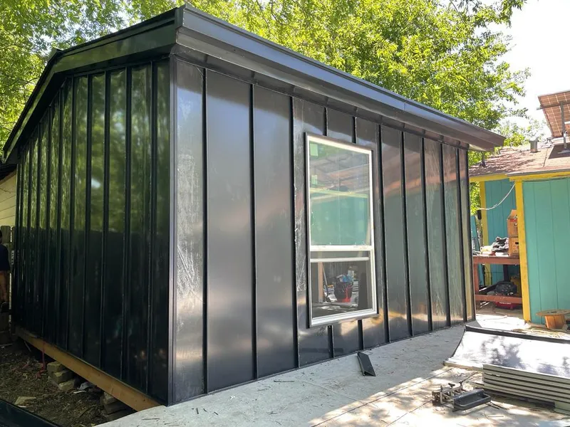 Black standing seam metal wall panels for Metal Roof Installation in Muskegon Heights