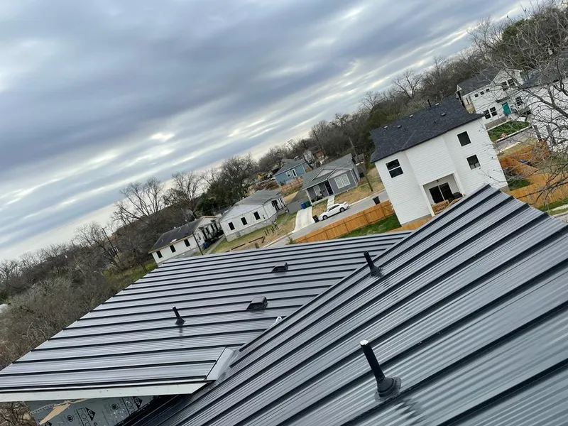 Standing seam metal roof panels with vents for Skylight Repair in Muskegon Heights